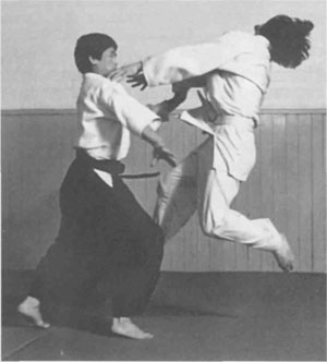 Kanetsuka Sensei executing a dynamic Kokyu-nage with Birge Sorensen as uke.